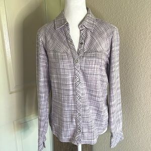 Patagonia women’s flannel shirt with pearl snaps. Size M